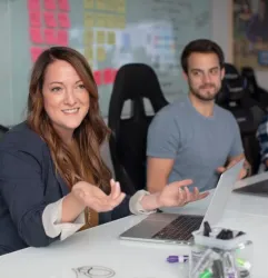 woman at desk talking