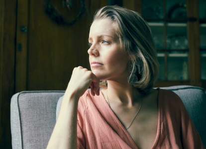 woman sitting sofa