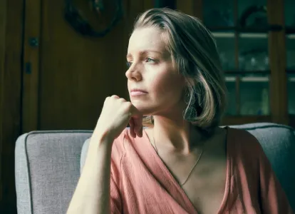 woman sitting sofa