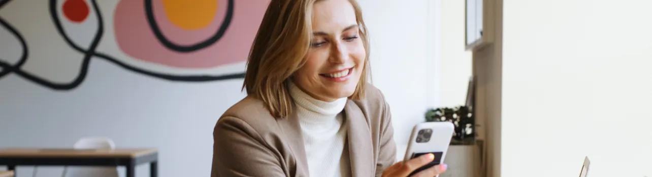 woman mobile and laptop