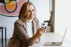 woman mobile and laptop